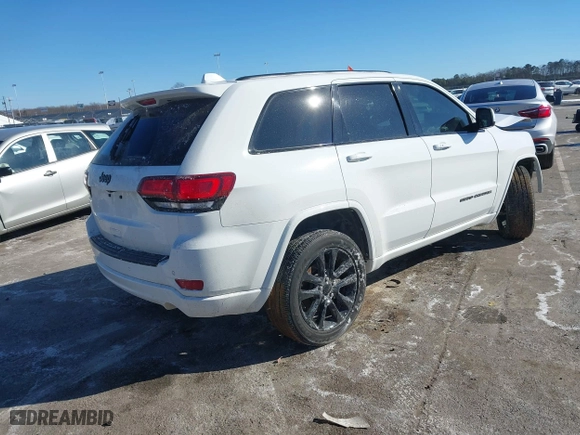 2021 Jeep Grand Cherokee Laredo X with VIN 1C4RJEAG0MC624799, listed as a IAAI auction lot 41409742 with 39,727 mi miles. Bid and sale history available at carsss.com. Image 4.