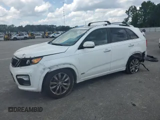 2013 Kia Sorento SX with VIN 5XYKWDA25DG386946, listed as a Copart auction lot 60664005 with 130,257 mi miles and Salvage title. Bid and sale history available at DreamBid. Image 1.