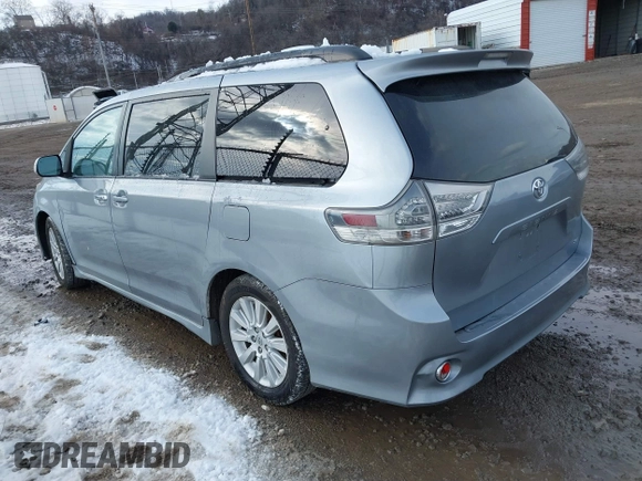 2013 Toyota Sienna SE with VIN 5TDXK3DC0DS354540, listed as a IAAI auction lot 41445501 with 238,814 mi miles and . Bid and sale history available at DreamBid. Image 3.