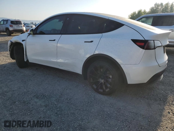 2022 Tesla Model Y Long Range with VIN 7SAYGAEE7NF376795, listed as a Copart auction lot 55113135 with 66,796 mi miles and Salvage Title. Bid and sale history available at carsss.com. Image 2.