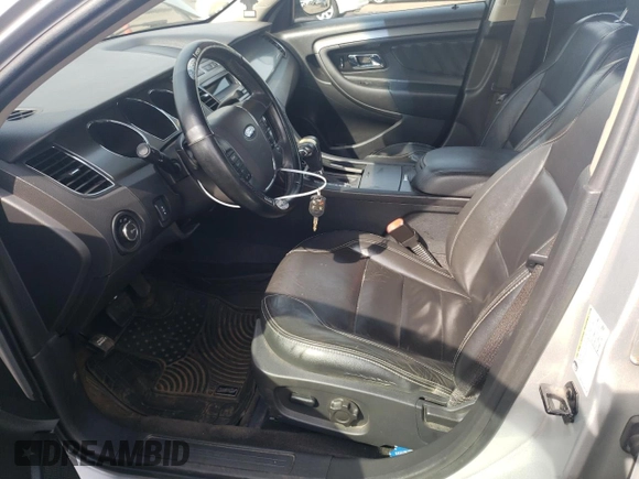 2012 Ford Taurus SEL z VIN 1FAHP2HW4CG129105, wystawiony jako Copart lot #54708445 z przebiegiem 201 450 mil mil oraz Szkoda całkowita • Salvage title. Historia ofert i sprzedaży dostępna na DreamBid. Obrazek 7.