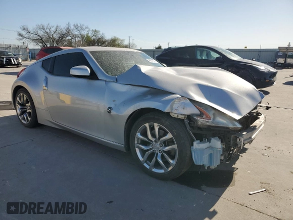 2013 Nissan 370Z with VIN JN1AZ4EH2DM880023, listed as a Copart auction lot 49601885 with 79,196 mi miles and Salvage Title. Bid and sale history available at carsss.com. Image 4.