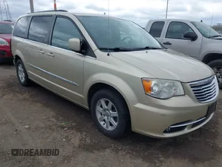 2011 Chrysler Town & Country Touring with VIN 2A4RR5DGXBR666934, listed as a IAAI auction lot 42022807 with 125,920 mi miles and . Bid and sale history available at DreamBid. Image 1.