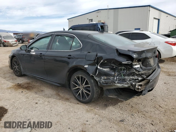 2022 Toyota Camry SE with VIN 4T1G11AK8NU029310, listed as a Copart auction lot 86824594 with 95,856 mi miles and Salvage Title. Bid and sale history available at carsss.com. Image 2.