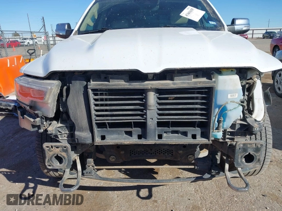 2020 Ram 1500 Limited with VIN 1C6SRFHT7LN258515, listed as a IAAI auction lot 41661635 with 125,699 mi miles and . Bid and sale history available at DreamBid. Image 6.