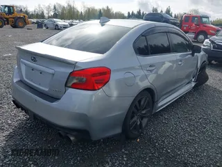 2016 Subaru WRX with VIN JF1VA1B60G9832069, listed as a IAAI auction lot 41954264 with 126,338 mi miles. Bid and sale history available at carsss.com. Image 4.