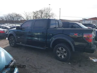 2011 Ford F-150 XLT with VIN 1FTFW1ET8BFC87962, listed as a IAAI auction lot 41660801 with 197,092 mi miles. Bid and sale history available at carsss.com. Image 14.