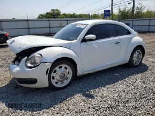 2016 Volkswagen Beetle Classic with VIN 3VWF17AT1GM630803, listed as a Copart auction lot 58632815 with 85,591 mi miles and Salvage title. Bid and sale history available at DreamBid. Image 1.