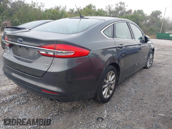 2018 Ford Fusion Energi SE with VIN 3FA6P0PU1JR130262, listed as a IAAI auction lot 41495217 with 68,708 mi miles. Bid and sale history available at carsss.com. Image 4.