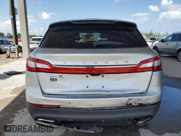2016 Lincoln MKX Select with VIN 2LMTJ6KR8GBL62837, listed as a Copart auction lot 52294975 with 101,360 mi miles and Salvage Title. Bid and sale history available at carsss.com. Image 6.