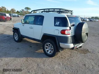 2014 Toyota FJ Cruiser with VIN JTEBU4BF1EK183485, listed as a IAAI auction lot 41185853 with 91,293 mi miles. Bid and sale history available at carsss.com. Image 3.