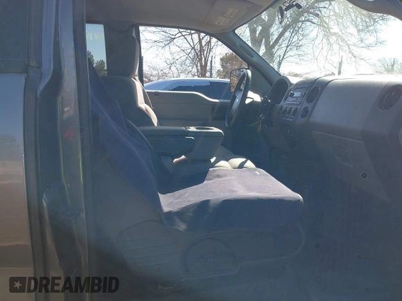 2005 Ford F-150 STX with VIN 1FTRX14W55NB19633, listed as a IAAI auction lot 41870057 with 100,436 mi miles. Bid and sale history available at carsss.com. Image 5.