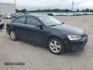 2014 Volkswagen Jetta TDI w/Premium with VIN 3VWLL7AJ0EM307240, listed as a Copart auction lot 59022185 with 104,600 mi miles and Salvage title. Bid and sale history available at DreamBid. Image 4.