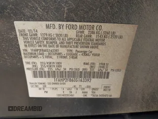 2014 Ford Taurus Limited with VIN 1FAHP2F86EG163392, listed as a IAAI auction lot 42538336 with 131,910 mi miles and . Bid and sale history available at DreamBid. Image 9.