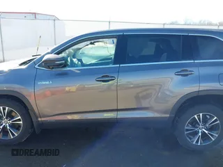 2019 Toyota Highlander Hybrid LE z VIN 5TDBGRFH3KS076303, wystawiony jako IAAI lot #41770576 z przebiegiem 15 591 mil mil oraz . Historia ofert i sprzedaży dostępna na DreamBid. Obrazek 15.
