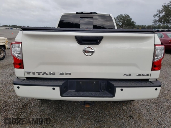 2018 Nissan Titan XD SV with VIN 1N6AA1F40JN518998, listed as a Copart auction lot 79595064 with 71,556 mi miles and Non Repairable. Bid and sale history available at carsss.com. Image 6.