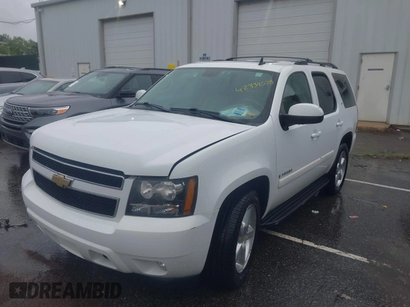 2009 Chevrolet Tahoe 2LT z VIN 1GNFC23059R217780, wystawiony jako IAAI lot #42334678 z przebiegiem 136 182 mil mil oraz . Historia ofert i sprzedaży dostępna na DreamBid. Obrazek 18.