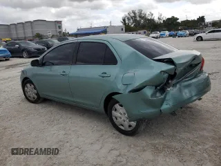 2007 Toyota Yaris with VIN JTDBT923271052472, listed as a Copart auction lot 50942975 with 147,363 mi miles and Salvage Title. Bid and sale history available at DreamBid. Image 2.