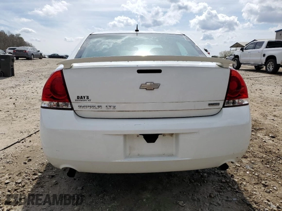 2015 Chevrolet Impala LTZ with VIN 2G1WC5E36F1123129, listed as a Copart auction lot 48795485 with 57,639 mi miles and Salvage Title. Bid and sale history available at DreamBid. Image 6.