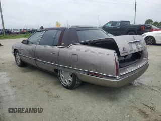 1995 Cadillac Concours z VIN 1G6KF52Y6SU244970, wystawiony jako Copart lot #75079524 z przebiegiem Nie podano mil oraz Szkody całkowita. Historia ofert i sprzedaży dostępna na DreamBid. Obrazek 2.