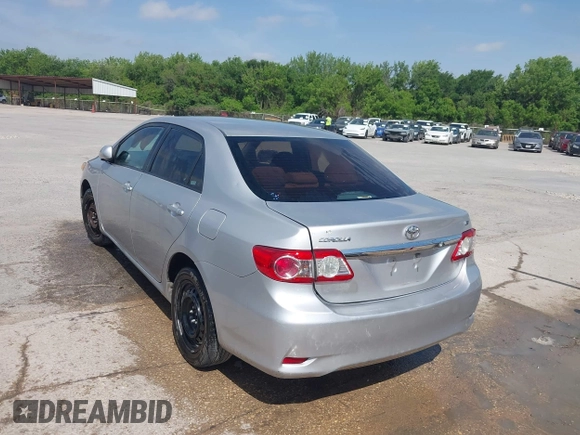 2012 Toyota Corolla L with VIN 2T1BU4EE1CC773885, listed as a IAAI auction lot 42004443 with 192,607 mi miles. Bid and sale history available at carsss.com. Image 3.
