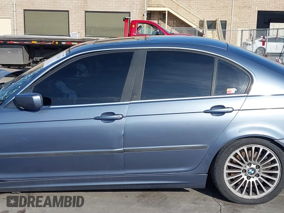 2003 BMW 3 Series 330i with VIN WBAEV53453KM03321, listed as a IAAI auction lot 41134433 with 186,586 mi miles. Bid and sale history available at carsss.com. Image 15.