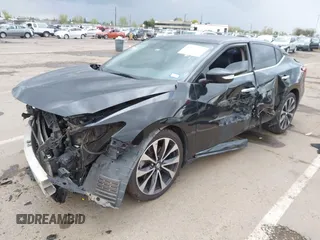 2016 Nissan Maxima SV z VIN 1N4AA6AP8GC408857, wystawiony jako IAAI lot #41892425 z przebiegiem 185 487 mil mil oraz . Historia ofert i sprzedaży dostępna na DreamBid. Obrazek 18.