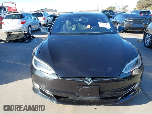 2017 Tesla Model S 60 with VIN 5YJSA1E19HF226094, listed as a IAAI auction lot 40931307 with 80,392 mi miles and . Bid and sale history available at DreamBid. Image 13.
