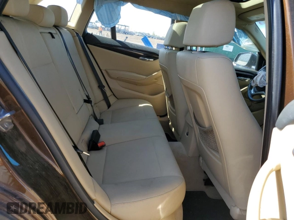 2015 BMW X1 xDrive28i z VIN WBAVL1C5XFVY35610, wystawiony jako Copart lot #54063125 z przebiegiem 115 279 mil mil oraz Szkoda całkowita • Salvage title. Historia ofert i sprzedaży dostępna na DreamBid. Obrazek 10.