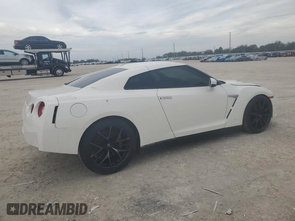 2015 Nissan GT-R Premium z VIN JN1AR5EF5FM281737, wystawiony jako Copart lot #80119804 z przebiegiem 50 726 mil mil oraz Szkoda całkowita • Salvage title. Historia ofert i sprzedaży dostępna na DreamBid. Obrazek 3.