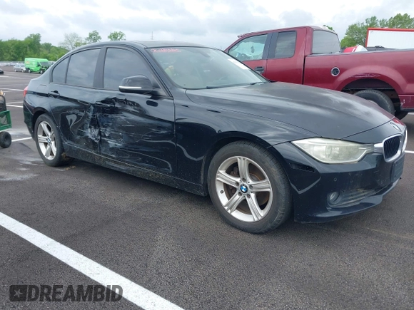 2015 BMW 3 Series 320i with VIN WBA3B1G57FNT05826, listed as a IAAI auction lot 42103193 with 128,800 mi miles. Bid and sale history available at carsss.com. Image 1.