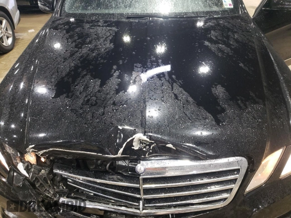 2013 Mercedes-Benz E 350 Luxury with VIN WDDHF5KB4DA668354, listed as a Copart auction lot 55921415 with 147,605 mi miles and Salvage Title. Bid and sale history available at DreamBid. Image 11.