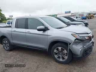 2018 Honda Ridgeline RTL with VIN 5FPYK3F52JB002649, listed as a IAAI auction lot 42338360 with 68,802 mi miles and . Bid and sale history available at DreamBid. Image 13.