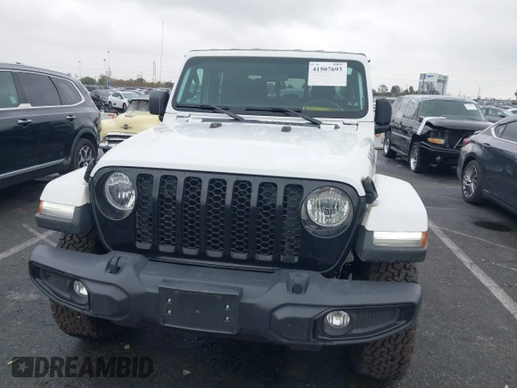 2022 Jeep Gladiator Willys with VIN 1C6HJTAG1NL148524, listed as a IAAI auction lot 41507693 with 42,004 mi miles and . Bid and sale history available at DreamBid. Image 12.