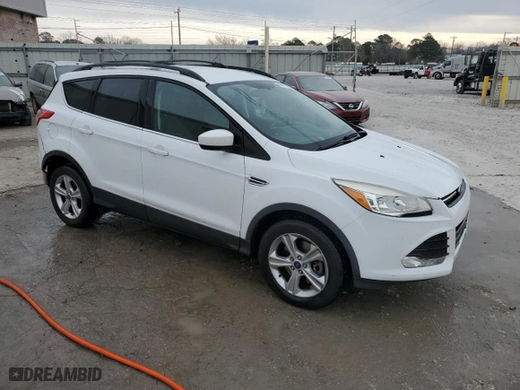 2015 Ford Escape SE with VIN 1FMCU9GX4FUC81791, listed as a Copart auction lot 46879665 with 211,457 mi miles and Salvage Title. Bid and sale history available at carsss.com. Image 4.