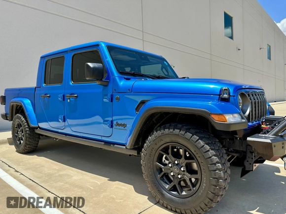 2024 Jeep Gladiator Sport S with VIN 1C6HJTAG0RL123040, listed as a IAAI auction lot 42628429 with 15,046 mi miles and . Bid and sale history available at DreamBid. Image 1.