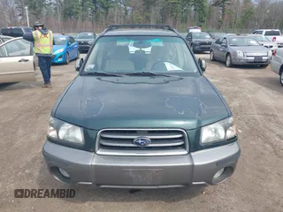 2003 Subaru Forester XS with VIN JF1SG65663H738935, listed as a IAAI auction lot 42119765 with 200,141 mi miles. Bid and sale history available at carsss.com. Image 13.