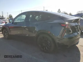 2024 Tesla Model Y with VIN 7SAYGDED7RF056973, listed as a Copart auction lot 55310705 with 15,391 mi miles and Salvage Title. Bid and sale history available at DreamBid. Image 2.