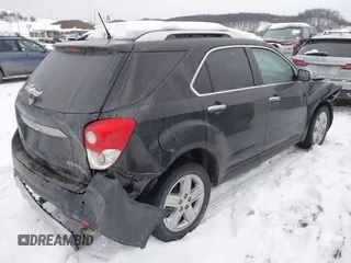 2014 Chevrolet Equinox LTZ with VIN 2GNFLHE39E6350753, listed as a IAAI auction lot 41356892 with 128,410 mi miles. Bid and sale history available at carsss.com. Image 4.