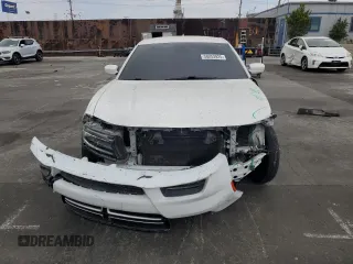 2015 Dodge Charger SXT z VIN 2C3CDXHG7FH721601, wystawiony jako Copart lot #58253925 z przebiegiem 123 004 mil mil oraz Szkoda całkowita • Salvage title. Historia ofert i sprzedaży dostępna na DreamBid. Obrazek 5.
