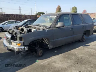 2004 GMC Yukon SLE with VIN 1GKEC13V34J114637, listed as a Copart auction lot 86000424 with 0 mi miles and Salvage Title. Bid and sale history available at carsss.com. Image 1.