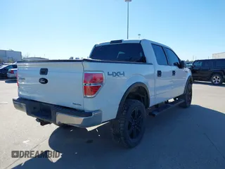 2014 Ford F-150 XL with VIN 1FTFW1EF0EFC74637, listed as a IAAI auction lot 41459594 with 164,970 mi miles. Bid and sale history available at carsss.com. Image 4.