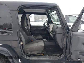 2005 Jeep Wrangler X with VIN 1J4FA39S55P353131, listed as a IAAI auction lot 41575949 with 154,026 mi miles and . Bid and sale history available at DreamBid. Image 5.