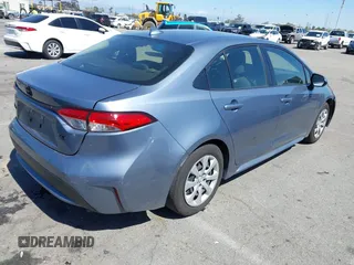 2022 Toyota Corolla LE with VIN JTDEPMAEXN3023746, listed as a IAAI auction lot 41838942 with 15,502 mi miles. Bid and sale history available at carsss.com. Image 4.