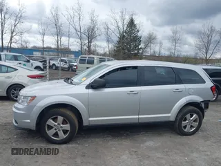 2013 Dodge Journey SE with VIN 3C4PDCAB9DT532554, listed as a IAAI auction lot 42026129 with 164,599 mi miles. Bid and sale history available at carsss.com. Image 15.