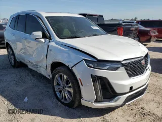 2024 Cadillac XT6 FWD Premium Luxury with VIN 1GYKPCRS1RZ700963, listed as a Copart auction lot 49031094 with 2,977 mi miles and Salvage Title. Bid and sale history available at carsss.com. Image 4.