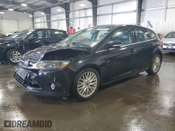 2014 Ford Focus Titanium with VIN 1FADP3N2XEL131392, listed as a Copart auction lot 61665025 with 105,597 mi miles and Salvage title. Bid and sale history available at DreamBid. Image 1.
