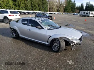 2005 Mazda RX-8 with VIN JM1FE173150149736, listed as a Copart auction lot 87021634 with 90,465 mi miles and Salvage Title. Bid and sale history available at carsss.com. Image 4.
