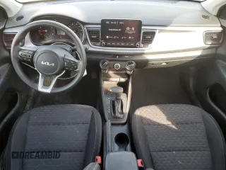 2023 Kia Rio S with VIN 3KPA24AD1PE615715, listed as a Copart auction lot 45717065 with 24,486 mi miles and Salvage Title. Bid and sale history available at carsss.com. Image 8.