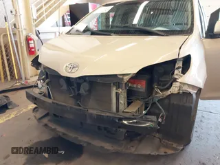 2013 Toyota Sienna LE AAS with VIN 5TDKK3DC8DS359172, listed as a IAAI auction lot 41724930 with 106,488 mi miles. Bid and sale history available at carsss.com. Image 6.